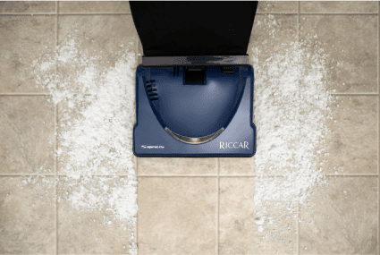 Riccar R10E Supralite Upright Vacuum picking up dust